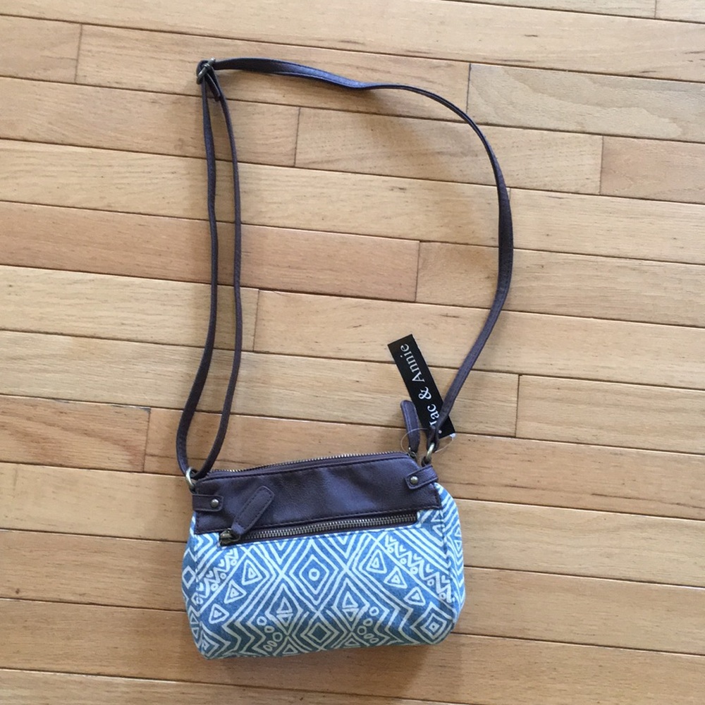 Cross body bag with adjustable strap.